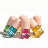 MQLE Flavor Vault 6'lı Aromalı Lip Oil Seti – altı aromanın birlikte ürün görünümü