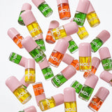 MQLE Flavor Vault 6'lı Aromalı Lip Oil Seti – ORANGE Lip Oil ve portakal temalı ürün görünümü